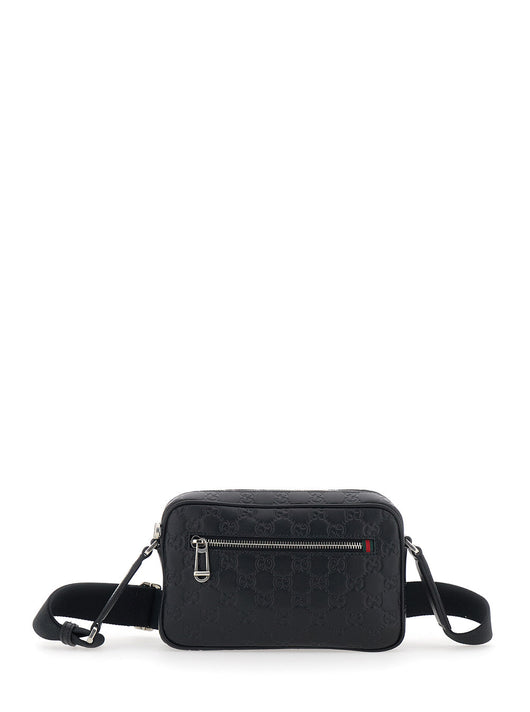 Gucci Men 'Emblem' Black Crossbody Bag With Adjustable Shoulder Strap And All-Over Embossed Gg Motif In Leather Man
