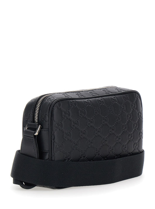 Gucci Men 'Emblem' Black Crossbody Bag With Adjustable Shoulder Strap And All-Over Embossed Gg Motif In Leather Man