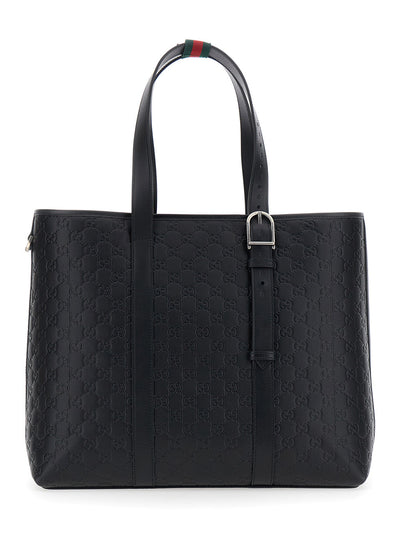 Gucci Men 'Emblem' Black Tote Bag With All-Over Embossed Gg Motif In Leather Man