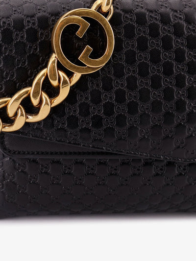 Gucci Women Leather Crossbody Bag With Embossed Gg Motif