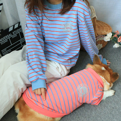 Dog pink owner blue